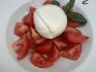 Caprese salad, a refreshing mix of mozzarella, tomatoes, and basil.