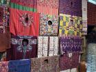 An assortment of traditional dresses known as traje