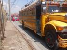 Two 'chicken buses' which are the means of public transport in Guatemala