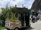 A colorful mototaxi outside of Guatapé