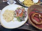 Trying traditional German food while in Luxembourg - here I had spätzle and a pretzel!