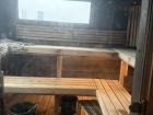 Inside Tanto Bastu, where people sit on wooden benches to warm up before their cold plunge