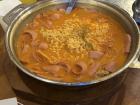 Noodle time! Korean Army Stew (Budae Jjigae) is a famous Korean stew filled with ramen noodles, cheese and delicious sausages. Perfect for sharing with friends!