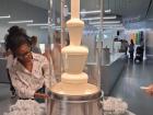 The fountain is protected by glass, with pumps that allow you to try the chocolate
