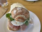 A prosciutto and mozzarella sandwich 