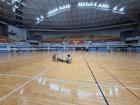 A photo of the badminton courts and the bleachers in NTU