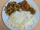 Rice with fried potatoes and tomato achar