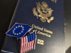 A US passport with the EU-American flag pin we all received on the trip!