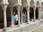 My cohort smiling around the arch in Girona's widest church