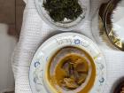 Homecooked achu soup and ndjama-ndjama, paired with fish and kanda