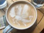 A latte with a dragon (or maybe a horse with wings?)
