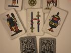 These Italian cards feature four suits: denari (coins), coppe (cups), spade (swords), and bastoni (clubs)