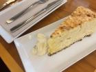 My first slice of Spanish tortilla, served on a plate alongside an aioli dipping sauce