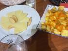 More Spanish tapas favorite: sliced Manchego cheese with breadsticks and fresh patatas bravas (fried potatoes topped with a special spicy sauce)