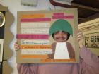 At school with one of their English projects from last year: all about an American photographer in Galicia.