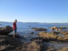 Standing among the rocks and waves, wind in my hair and salt on my face.