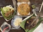 Lao dinner with friends, including sticky rice and fish! 