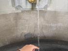 At the Elisenbrunnen, you can touch the water from the natural hot spring!