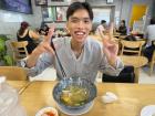 My GOAT Lọc and his finished bowl of bún cá