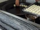 Pan fried soup dumplings cooking