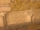 A piece of an older Roman building, put to a "new" use