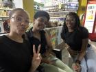 A friend of mine, another Peace Corps Volunteer, and myself all hanging out and chatting at my favorite colmado!