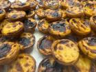 These are "pastéis de nata" and they are considered the most famous pastry and dessert in Portugal
