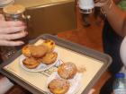 Warm custard tarts topped with cinnamon and powdered sugar