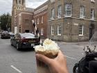 Trying a coffee from Fitzbillies, a famous bakery and café that started right here in Cambridge!