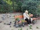 Spotted a woman in a park in Madrid feeding breadcrumbs to pigeons and parakeets, just like Mary Poppins!