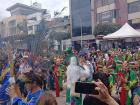 Amazon culture represented through costume and music in a parade.