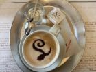 Coffee in Prague, complete with the small glass of water