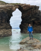 Admiring rock formations at Playa de las Catedrales (Cathedral Beach), a beautiful beach in northern Galicia.