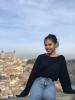 In this picture I was sitting on top of a ledge which had an overview of the town Toledo in Spain.