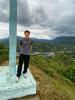 Standing at the top of a mountain overlooking my town. 