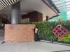Me at the entrance of the school I attend in HongKong