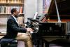 My piano professor taking a picture of me during my piano exam, I love this instrument!