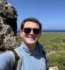 Selfie on top of rock climbing cliff in Curaçao! First time rock climbing and I made it to the top!
